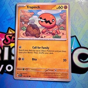 trapinch (104/191) - common — pokémon: surging sparks